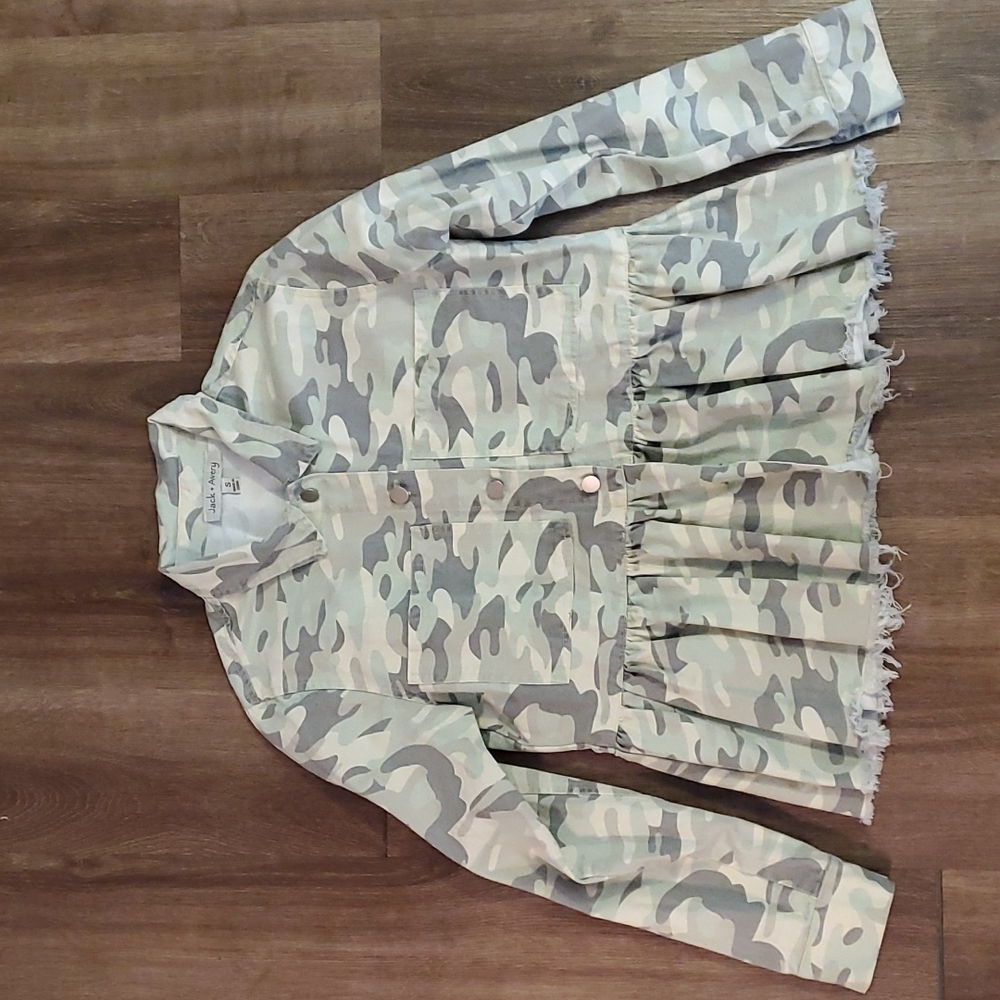 Juniors small, buttoned camouflage utility jacket with ruffle bottom.